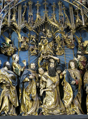 Im Hochaltar der Marienkirche von Krakau ist  "Mari Entschlafung" dargestellt. Maria sinkt zu Boden, Apostel versuchen ihr zu helfen.